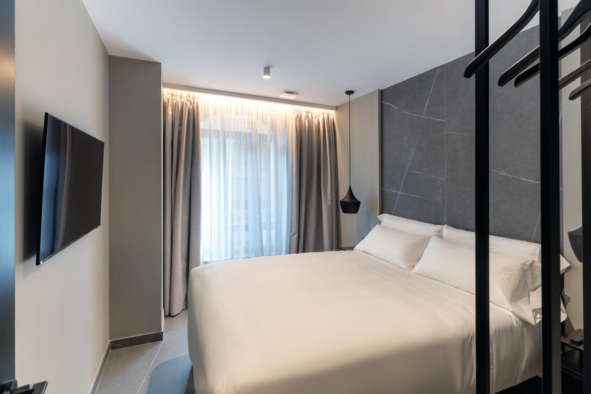 Mauro Suites León Pokoj fotografie